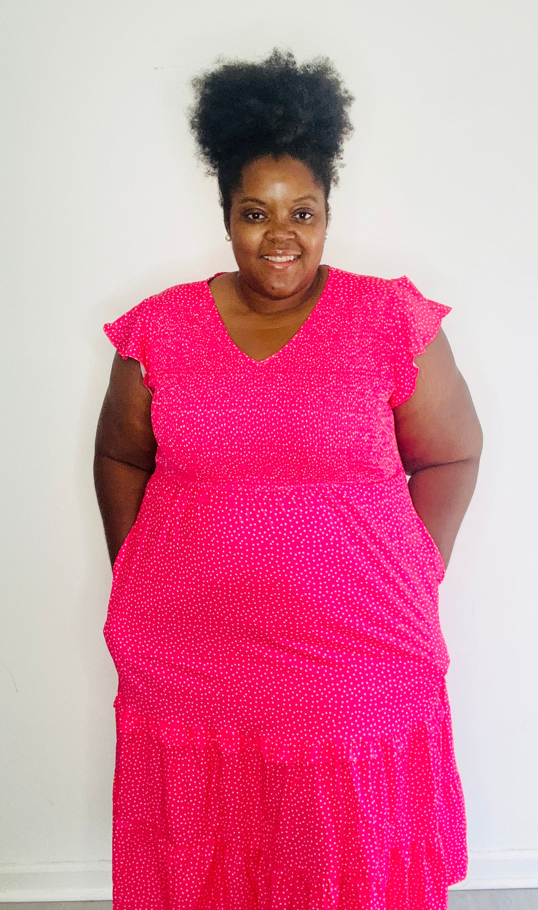 Pink polka dot smocked midi dress