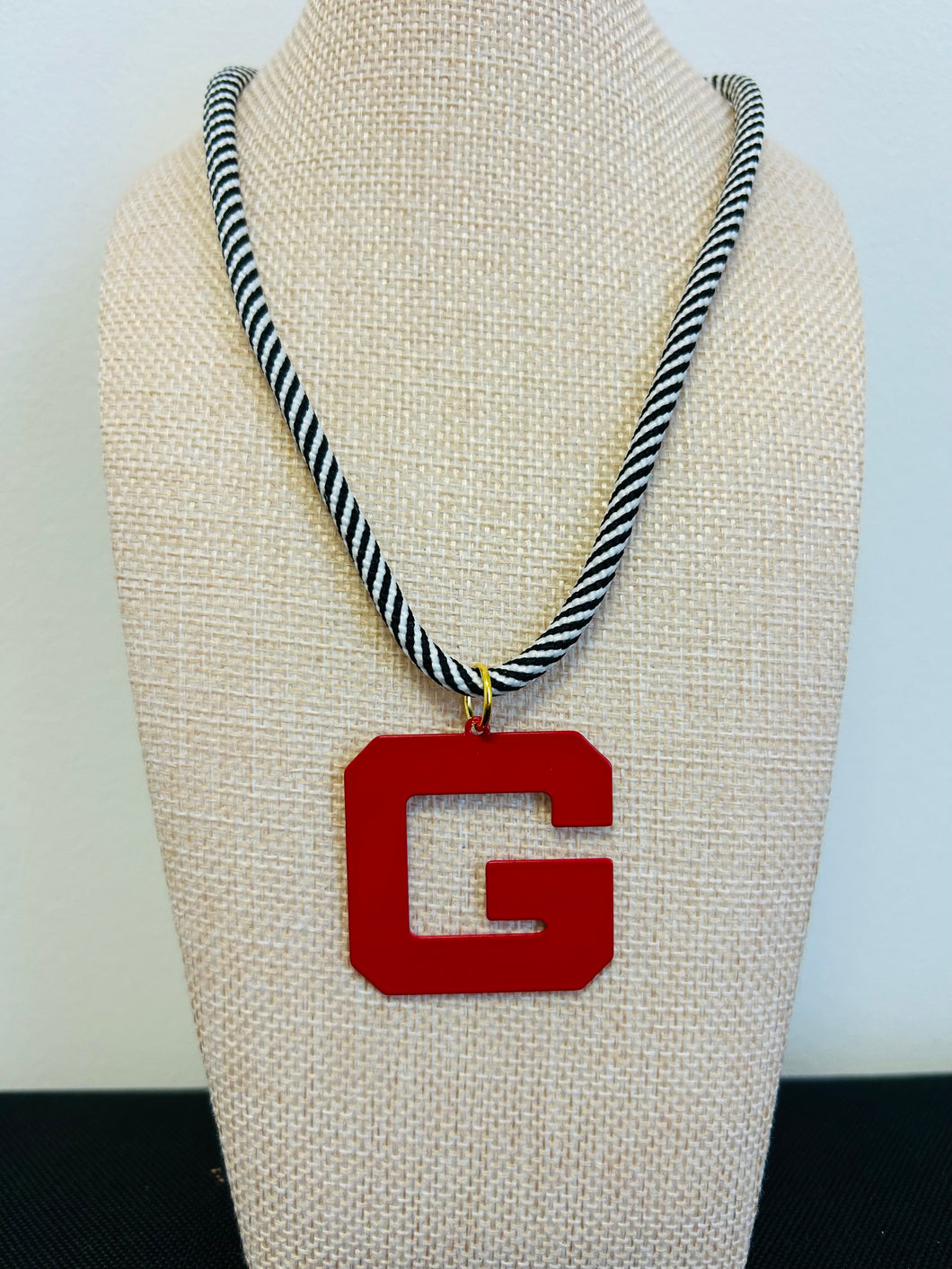 Red G black and white rope necklace
