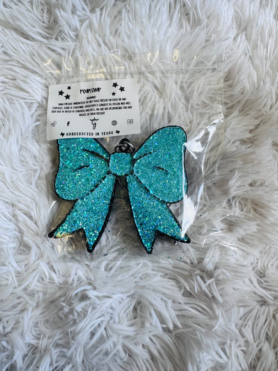 Teal glitter bow